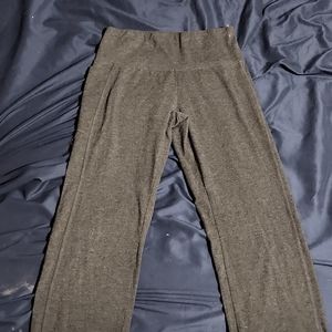 Yoga pants wider at the bottom their a small in women and they are dark Grey
